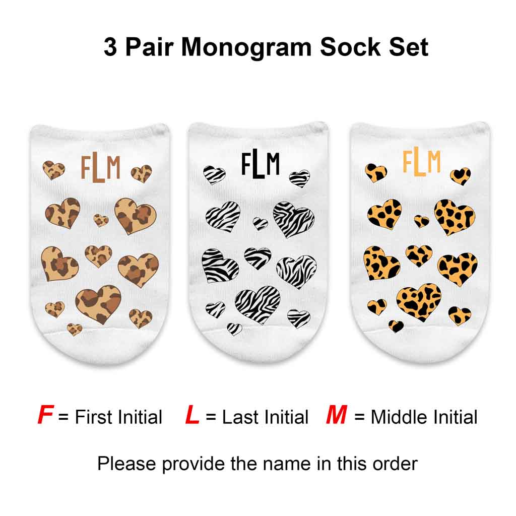 Three pair set of no show socks custom printed with animal print hearts and personalized with your monogram initials in a gift box.