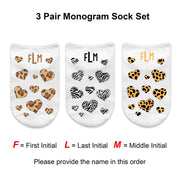 Three pair set of no show socks custom printed with animal print hearts and personalized with your monogram initials in a gift box.