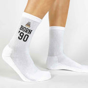 Birthday socks for her with fun birthday year printed on white cotton crew socks and a gift box included.