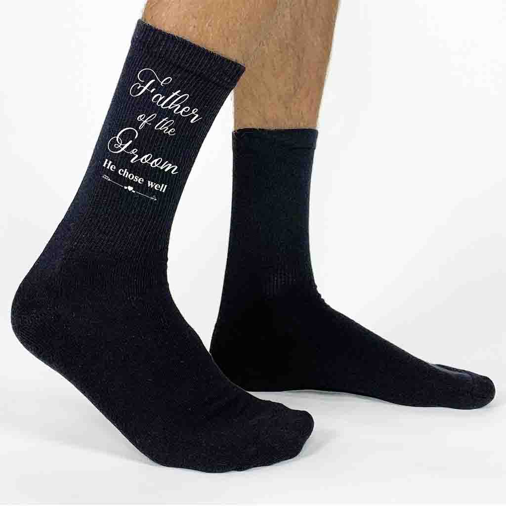 Father of the groom wedding party socks digitally printed with fun saying he chose well design printed on the outside of both socks.