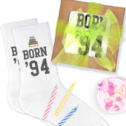 GIft wrap included with purchase of white cotton crew socks custom printed with birthday year design.