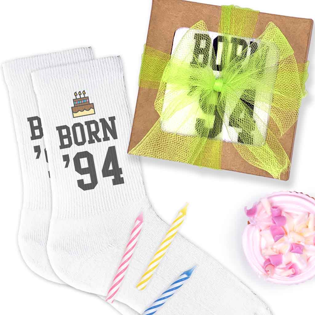 GIft wrap included with purchase of white cotton crew socks custom printed with birthday year design.