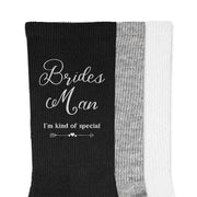 Wedding party socks with fun saying I'm king of special for the brides man printed on the outside of both socks is the perfect wedding accessory.