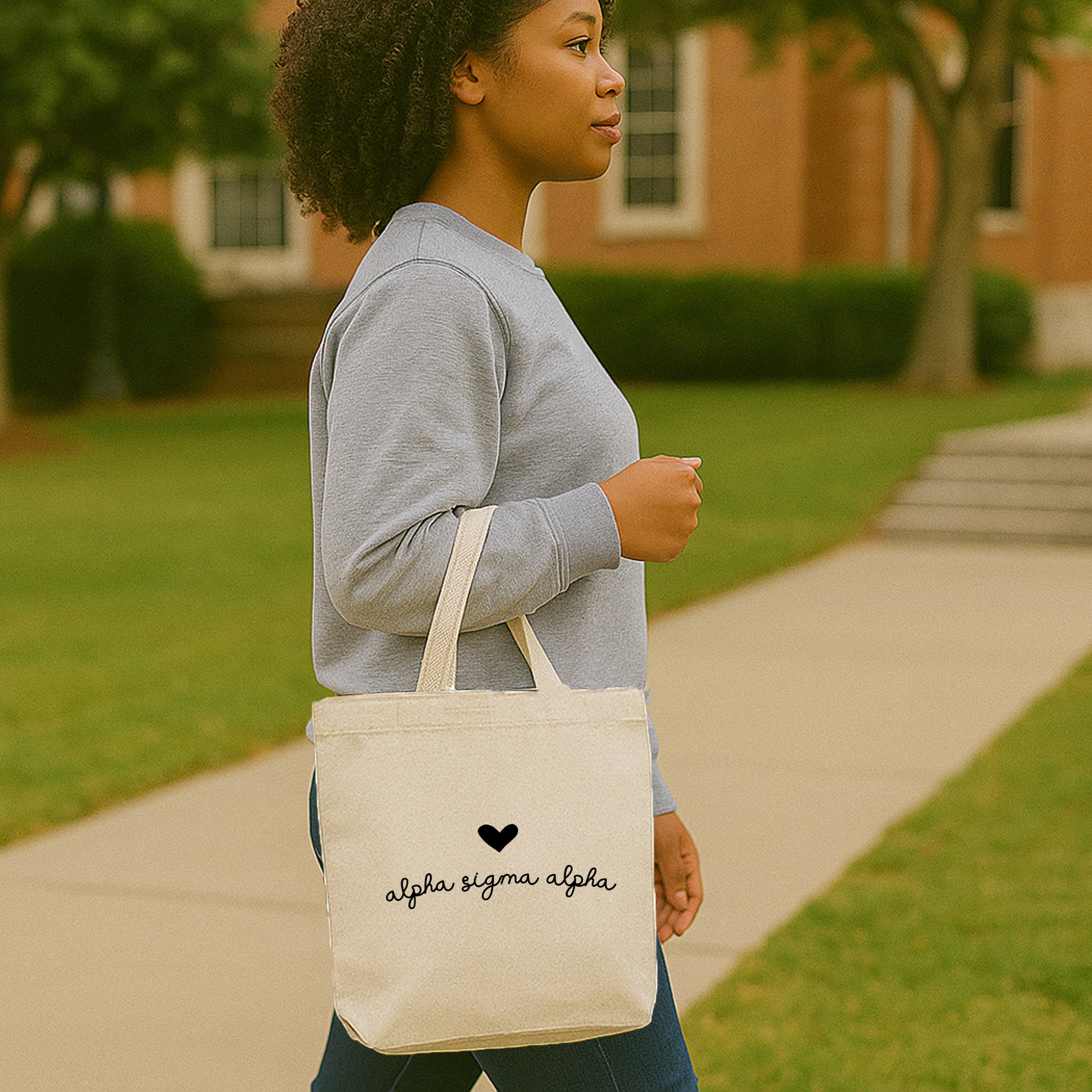 Alpha Sigma Alpha canvas tote bag with heart and ASA Greek letters, used as a Bid Day gift.