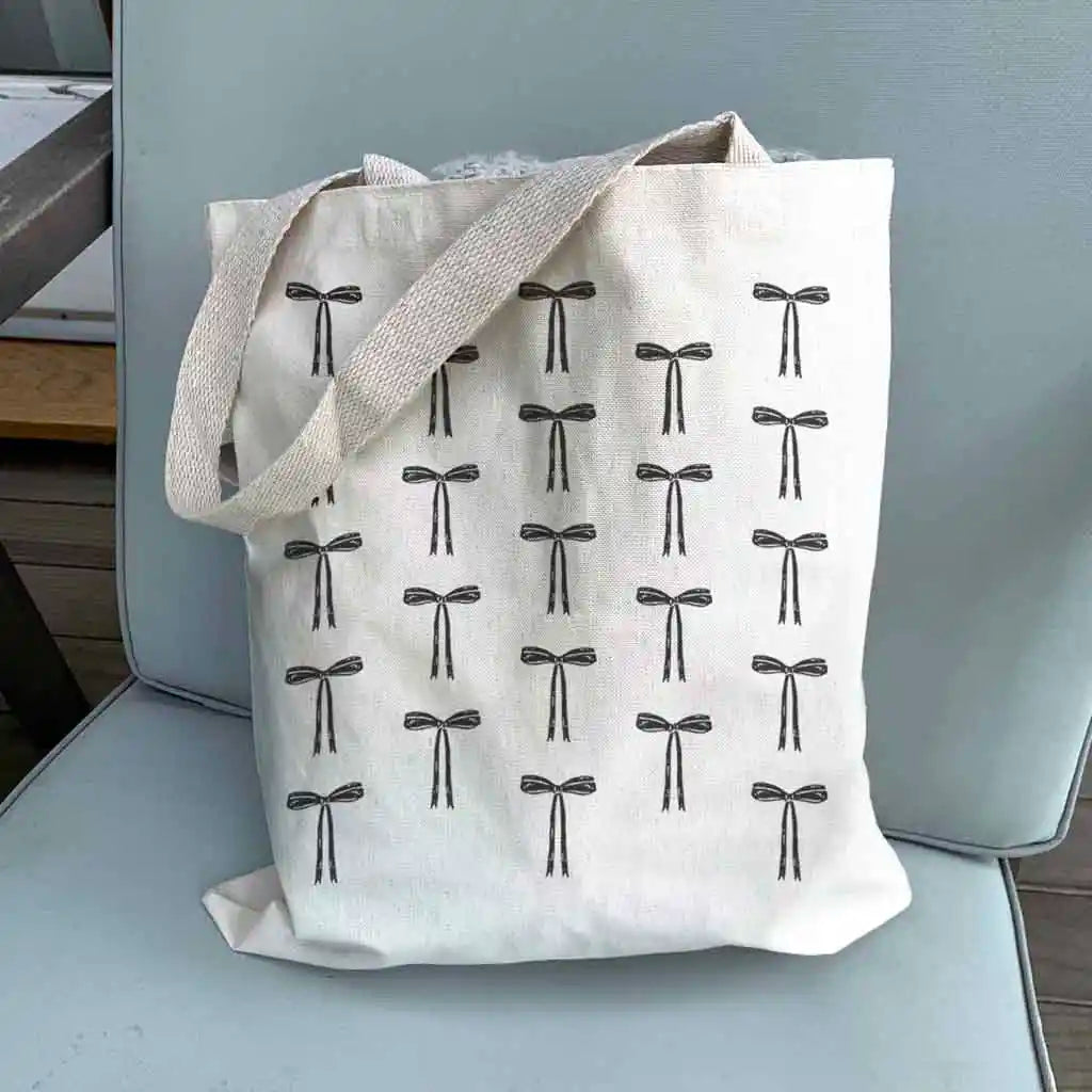 Perfect for adding a touch of charm to any outfit, whether you're hitting the town or running errands. Elevate your accessory game with this chic and versatile tote!
