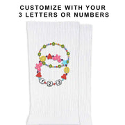 Customizable bracelet beads add a unique touch to these Eras Tour-inspired socks.