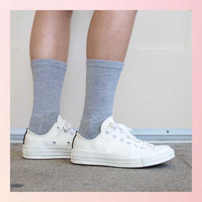 Custom print on a pair of gray heather crew socks for women. Use Sockprints easy to use design tool to design your own pair of custom printed and personalized socks. No minimums and bulk discounts are available for larger orders.