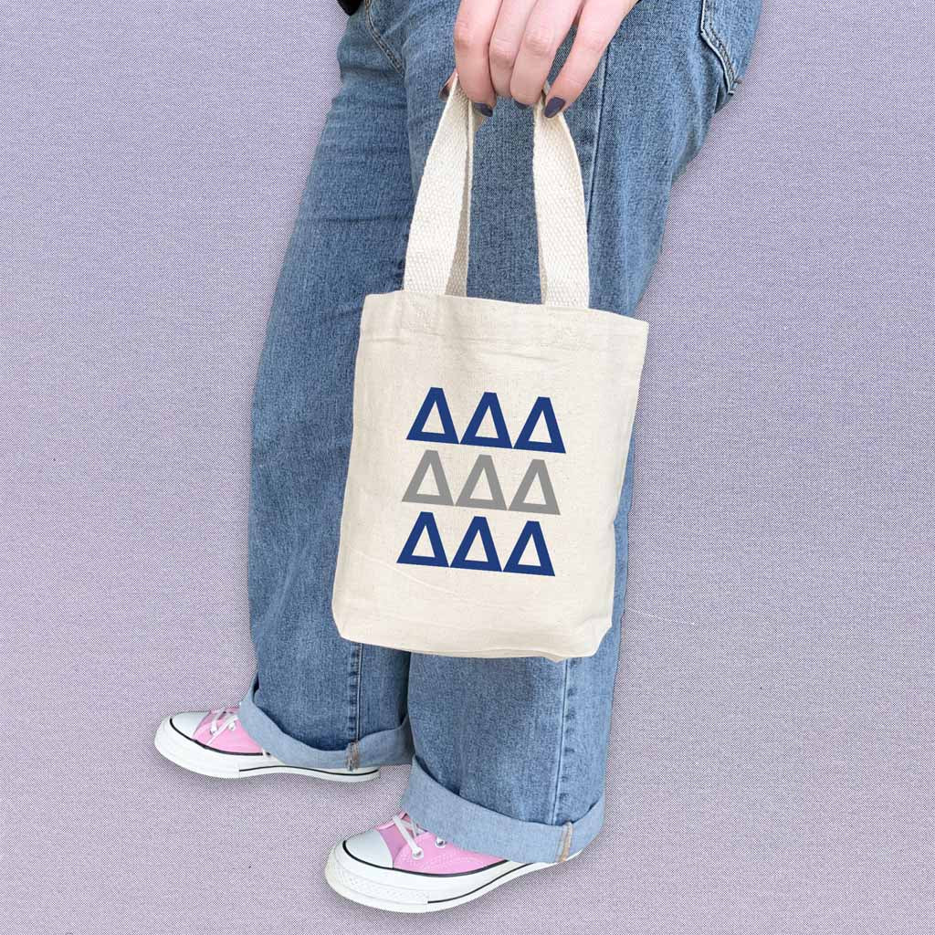 Tri Delta sorority letters in sorority colors digitally printed on the perfect mini size natural canvas tote bag.