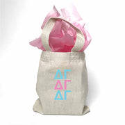 Sorority greek letters printed in sorority colors on natural canvas mini tote gift bag.