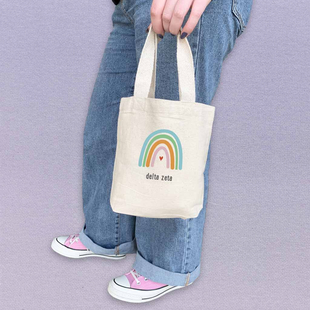 Delta Zeta sorority name rainbow design digitally printed on natural mini tote gift bag.