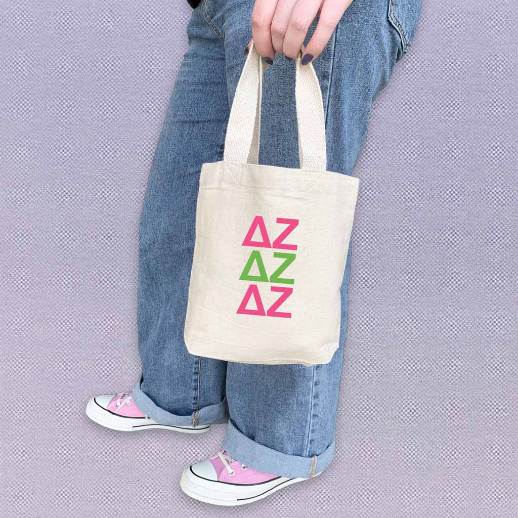 Delta Zeta sorority letters in sorority colors digitally printed on the perfect mini size natural canvas tote bag.