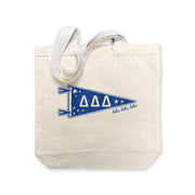 Delta Delta Delta collegiate pennant medium size canvas tote bag featuring Tri Delta Greek letters on a white background