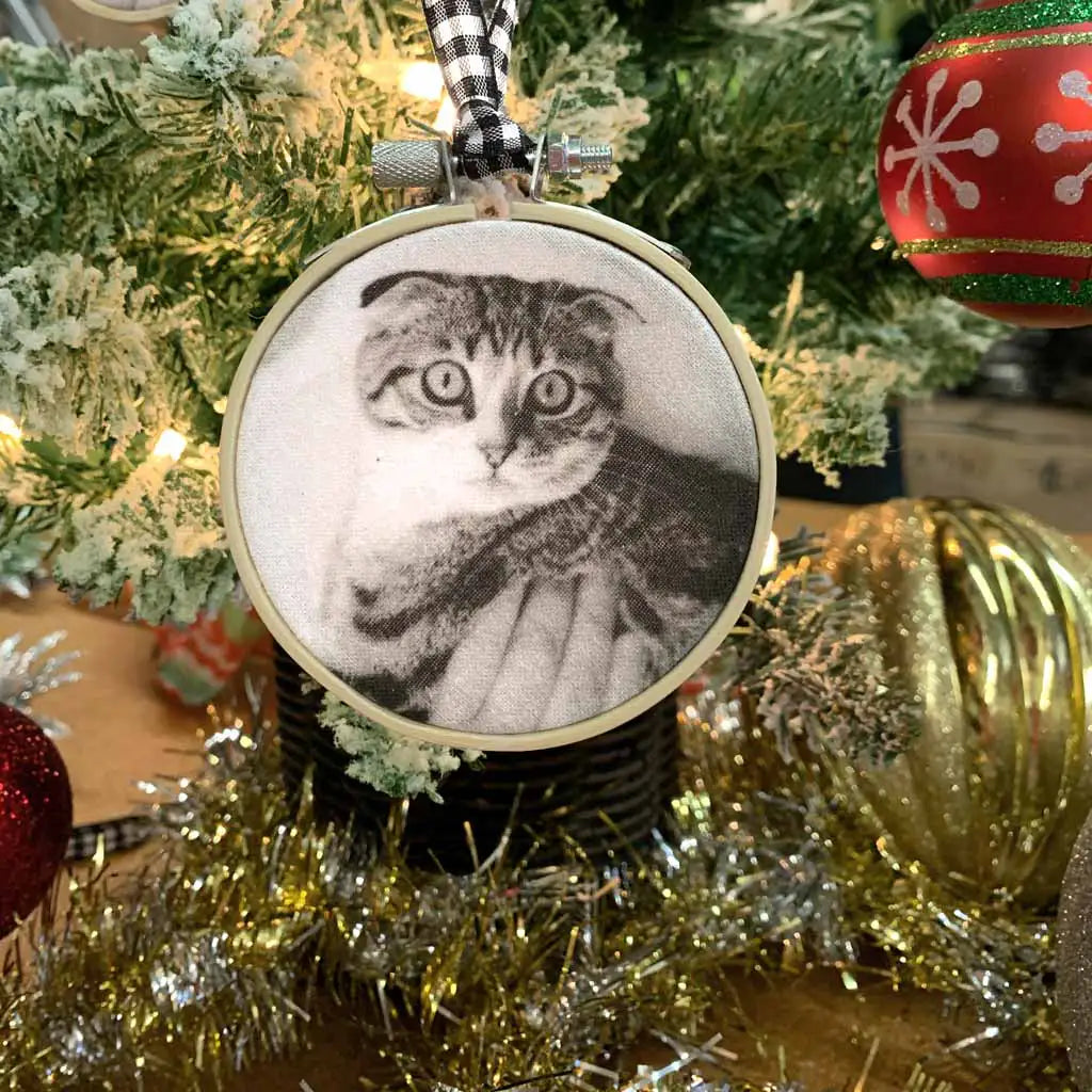 Special holiday ornament custom printed with your own photo of your cat or animal in a gift box.