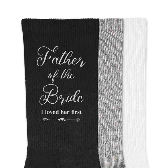 Father of the bride wedding day socks digitally printed with a cute saying I loved her first design printed on the outside of the socks.