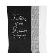 Wedding party socks with fun saying he chose well design for the father of the groom printed on the outside of the cotton socks.
