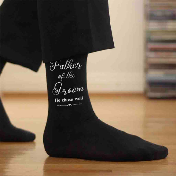 Wedding party socks with fun saying he chose well design for the father of the groom printed on the outside of the cotton socks.