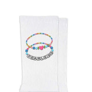 Fun socks with a Swiftie twist, friendship bracelet design with the word fearless made popular by Taylor Swift