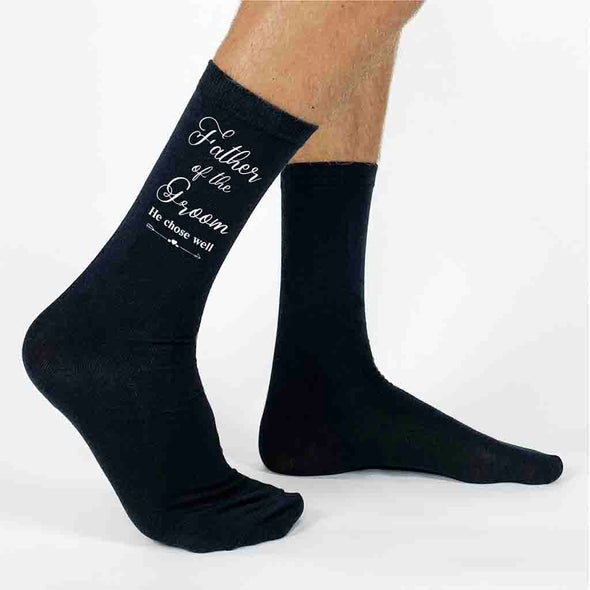 Father of the groom wedding party socks digitally printed with fun saying he chose well design printed on the outside of both socks.