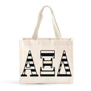 Front view of Alpha Xi Delta small black and whie stripe tote bag