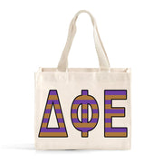 Front view of Delta Phi Epsilon Greek letters in sorority colors small striped tote bag
