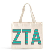 Front view of Zeta Tau Alpha Greek letters in sorority colors small striped tote bag