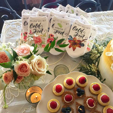 Custom printed socks for a bridal shower make great party momentos to give as a personalized party favor for the special occasion.