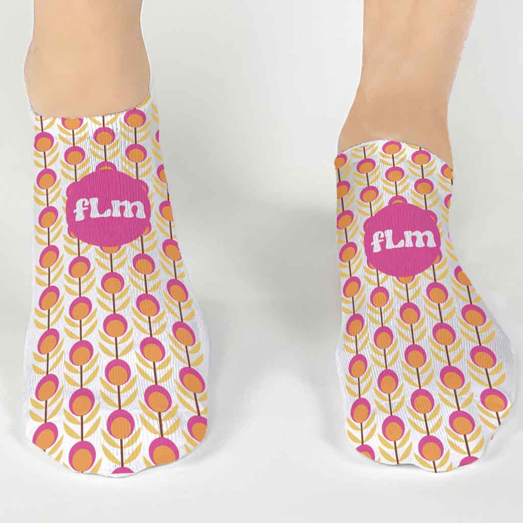 Fun flower design custom printed on white cotton no show socks personalized with your monogram initials in a three pair gift box set.
