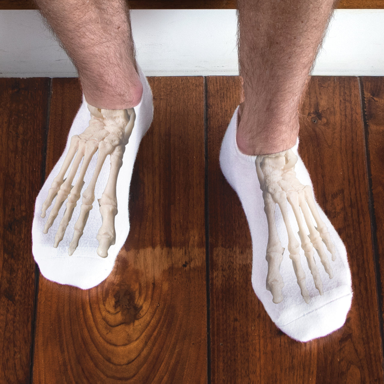 White no show socks featuring a detailed anatomical bones of the foot design