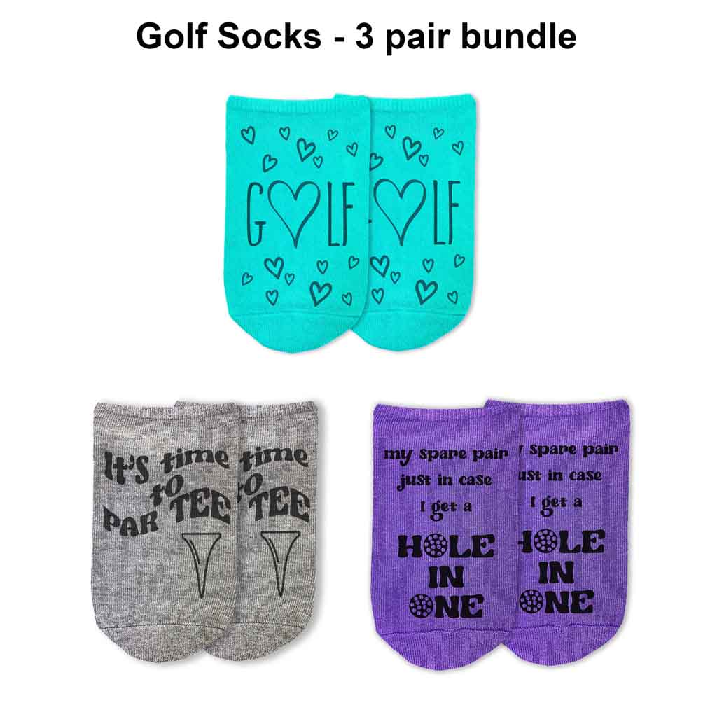 Super fun golf socks for women, the perfect pair of socks for game day. Sold as a set of 3 pairs in assorted colors, these golf socks feature a different golf saying printed on each pair.