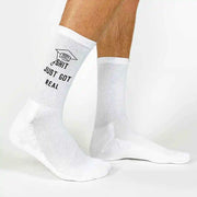 Funny 2024 graduation gift socks custom printed with class of 2024 Sh*T Just Got Real printed on the outsides of both socks make a great gift for your graduating senior.
