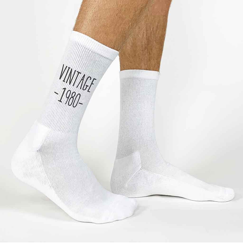 Happy birthday vintage design printed on white crew socks.