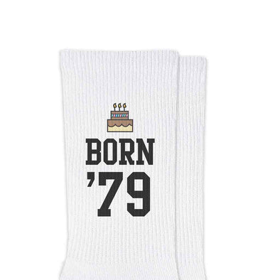 Happy birthday socks custom printed with cute cake design and personalized with your birth year printed on crew socks with a gift wrap box and ribbon.