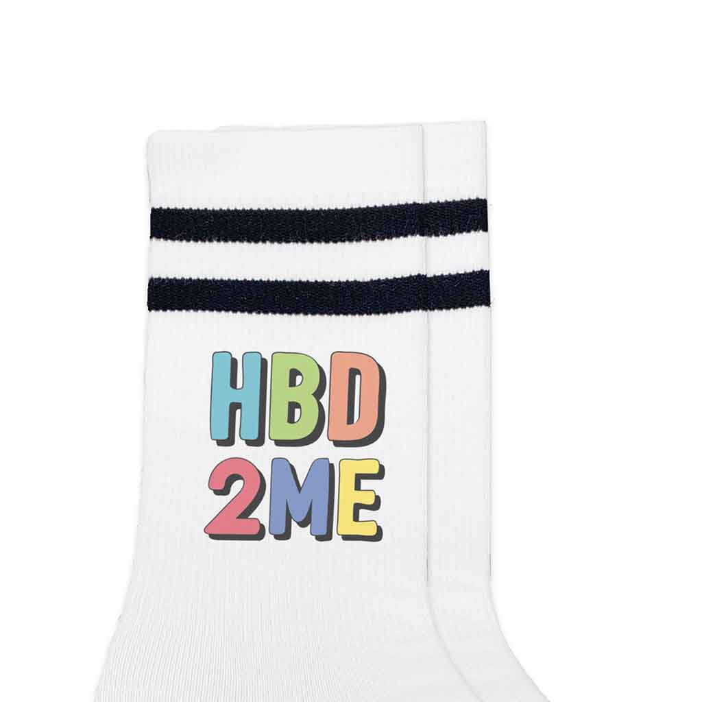 HBD 2ME happy birthday to me digitally printed on white socks with black stripes with a gift box.