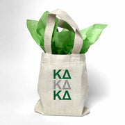 Sorority greek letters printed in sorority colors on natural canvas mini tote gift bag.