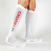 All you need is love with these created equal rainbow design custom printed on the sides of white cotton knee high socks perfect for LGBTQ rights.