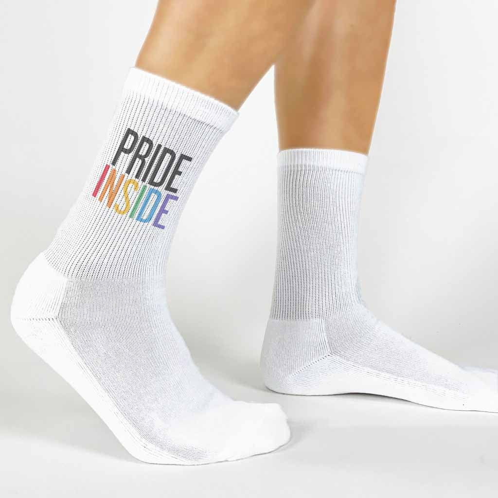 Custom printed pride inside rainbow letter design on comfy white cotton crew socks are perfect for your LGBTQ friends.