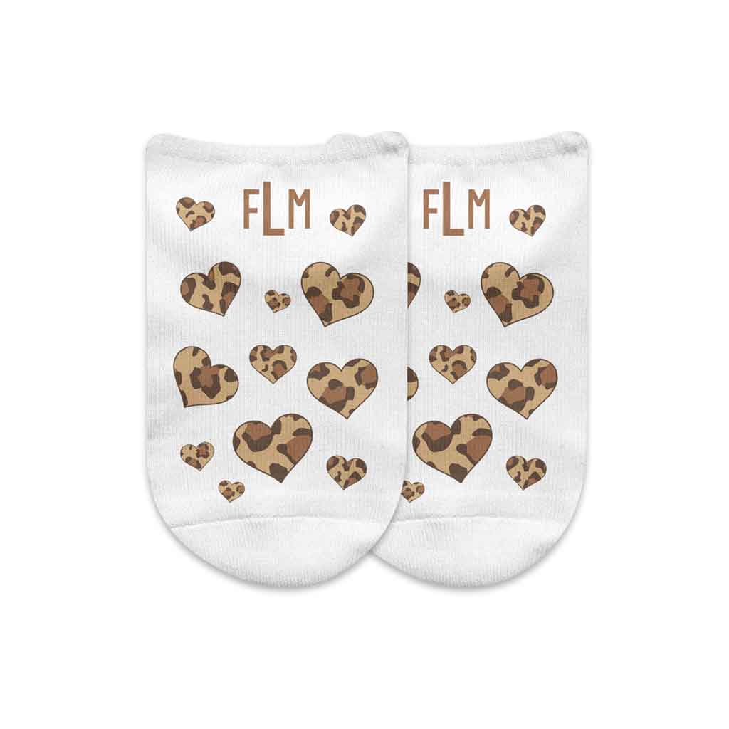 Leopard print animal hearts design digitally printed on no show socks and personalized with your monogram initials in a 3 pair set in a gift box.