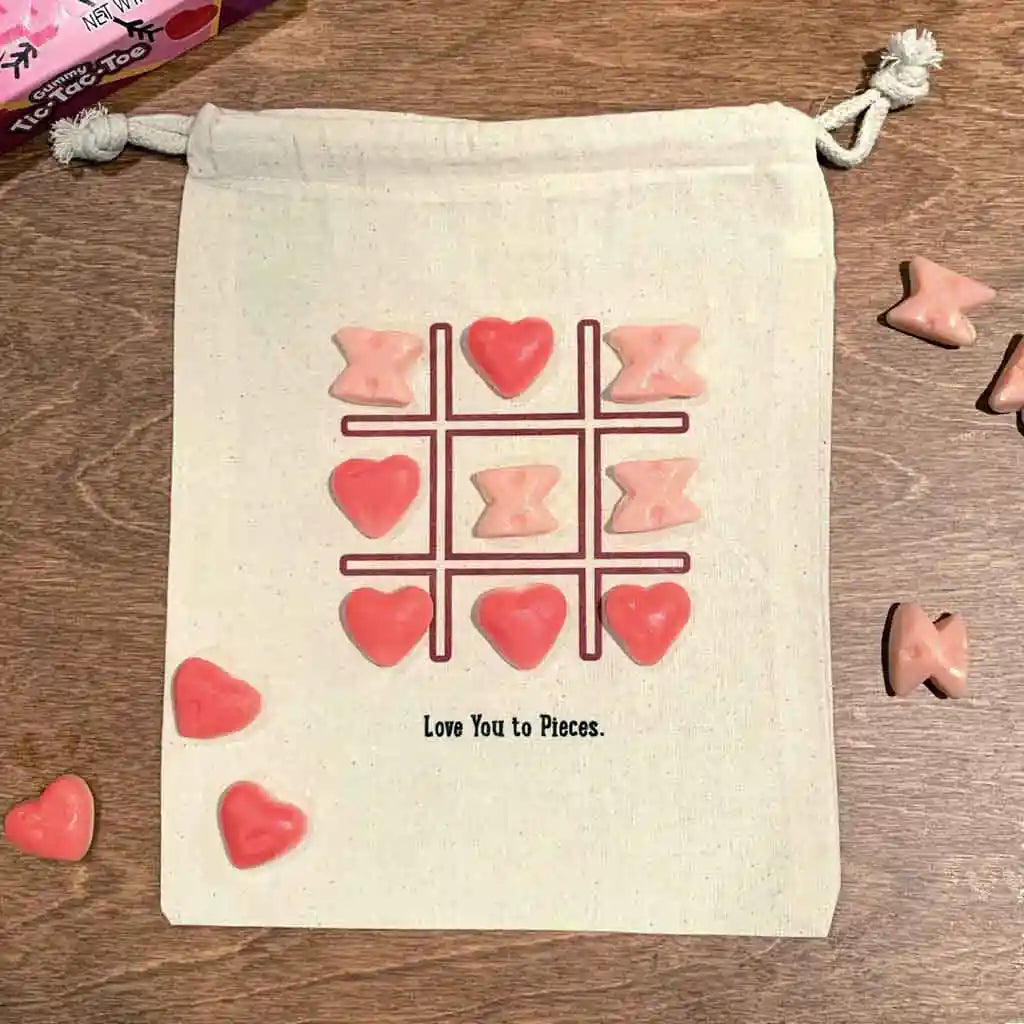 Valentines goodie bags with assorted sayings digitally printed on canvas bags sold in a pack of four.