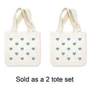 All over heart design digitally printed on mini gift bags sold as a set of two.