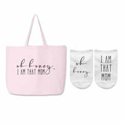 Pink canvas tote with matching socks with the saying "oh honey, I am that mom"