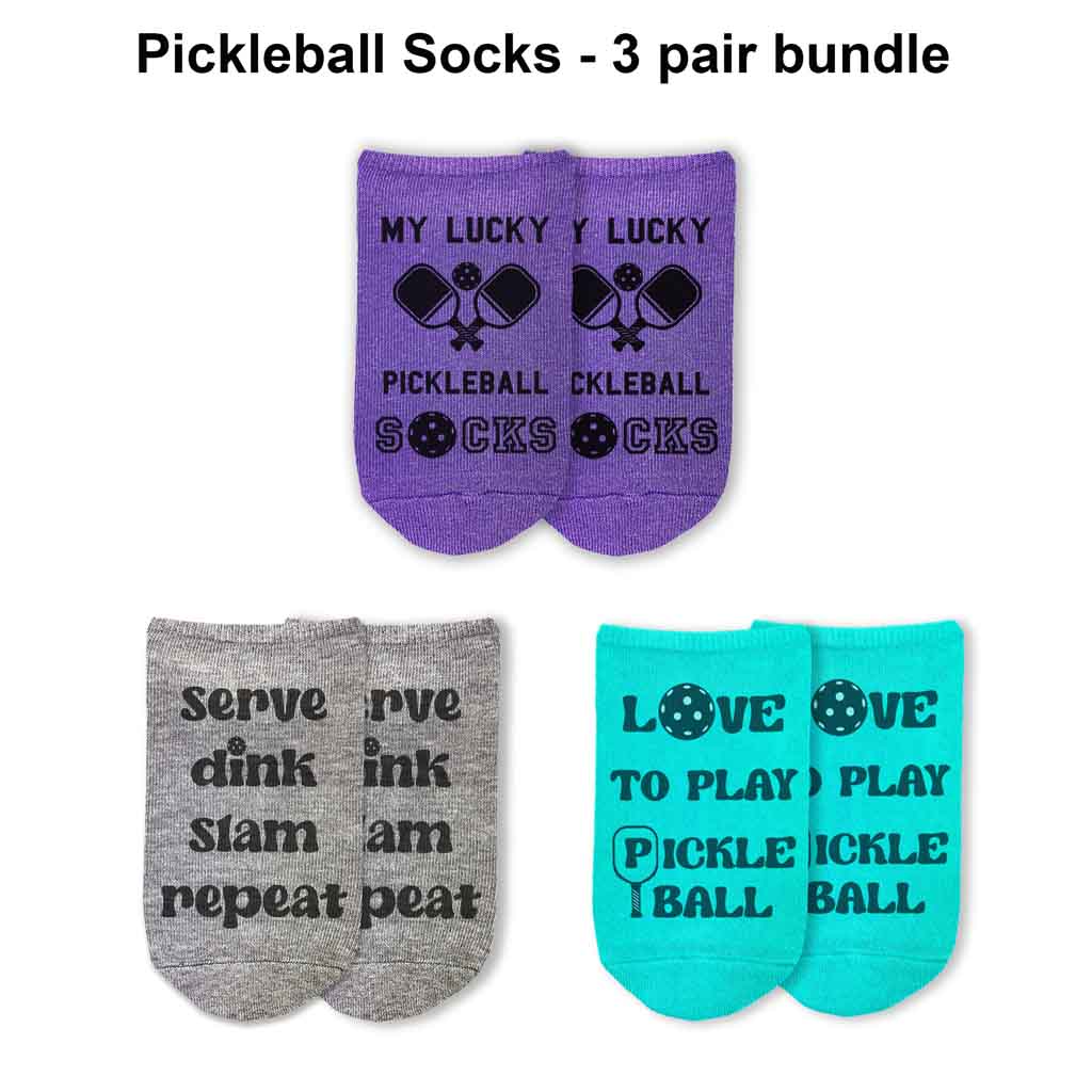 Super fun pickleball socks for women, the perfect pair of socks for game day. Sold as a set of 3 pairs of socks in assorted colors, these pickleball socks have a different pickleball saying printed on each pair.