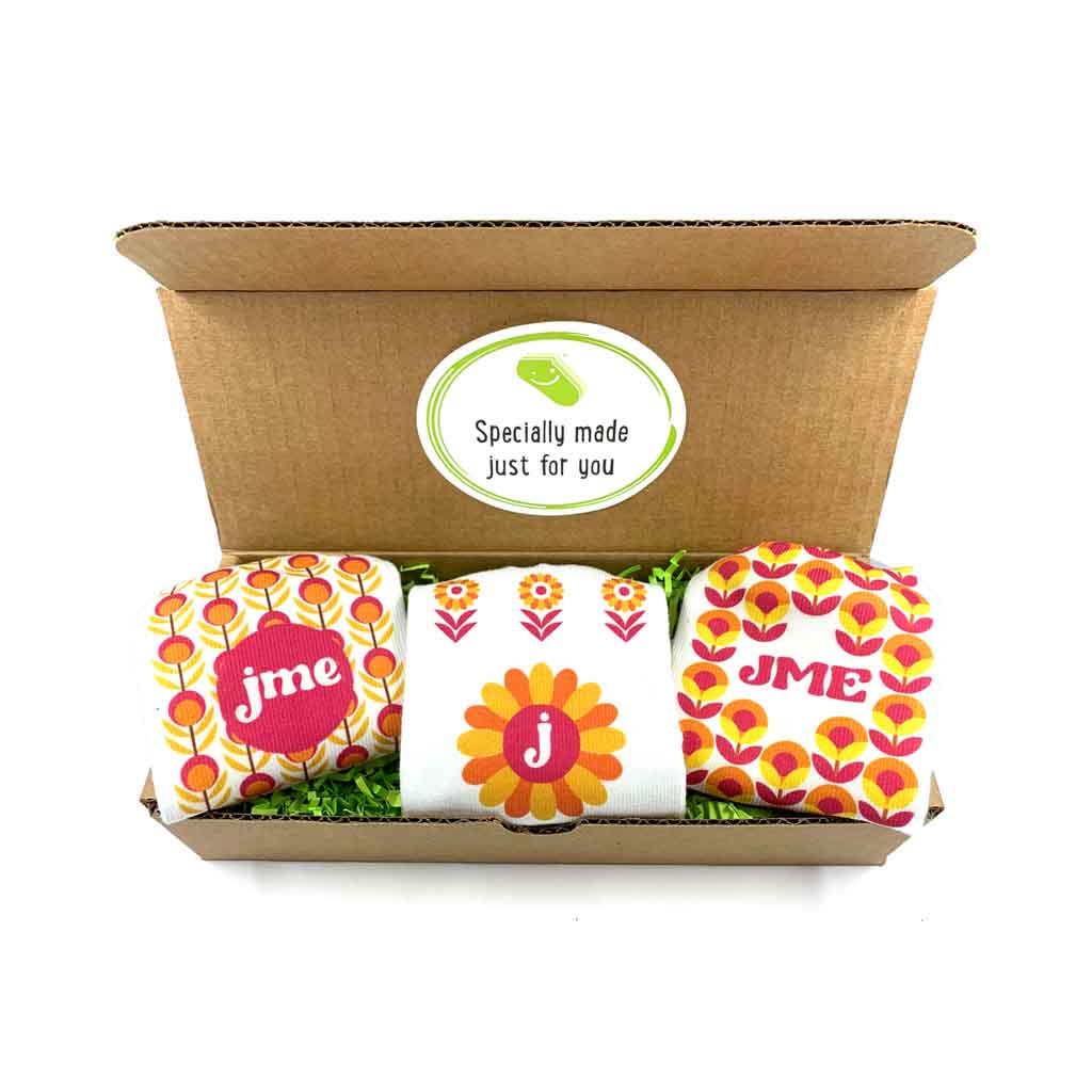 Custom floral pop monogram socks in a gift box digitally printed.