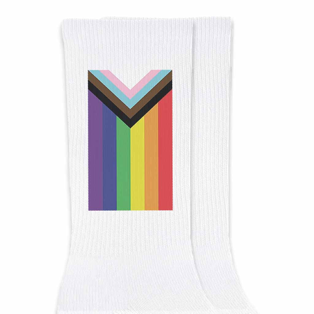 Progress pride flag digitally printed on comfy white cotton crew socks are perfect for the pride month celebration.