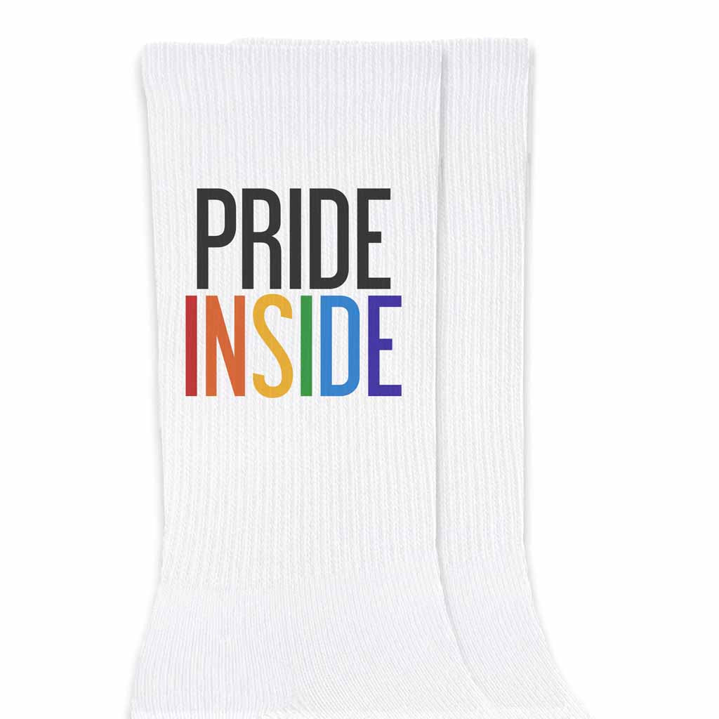 Pride inside rainbow design custom printed on the outside of comfy white cotton crew socks are the perfect accessory for your LGBTQ pride friends.