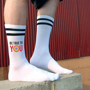 Be True to You rainbow heart design printed on white cotton crew socks with black stripes are designed to inspire and empower you to embrace your authentic self.