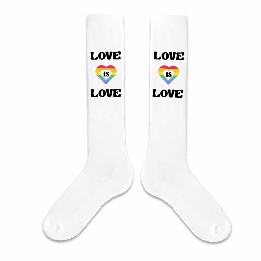 Love is love rainbow design digitally printed on the outside of white cotton knee high socks are perfect to wear to show your support for pride month.