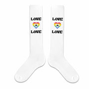 Love is love rainbow design digitally printed on the outside of white cotton knee high socks are perfect to wear to show your support for pride month.