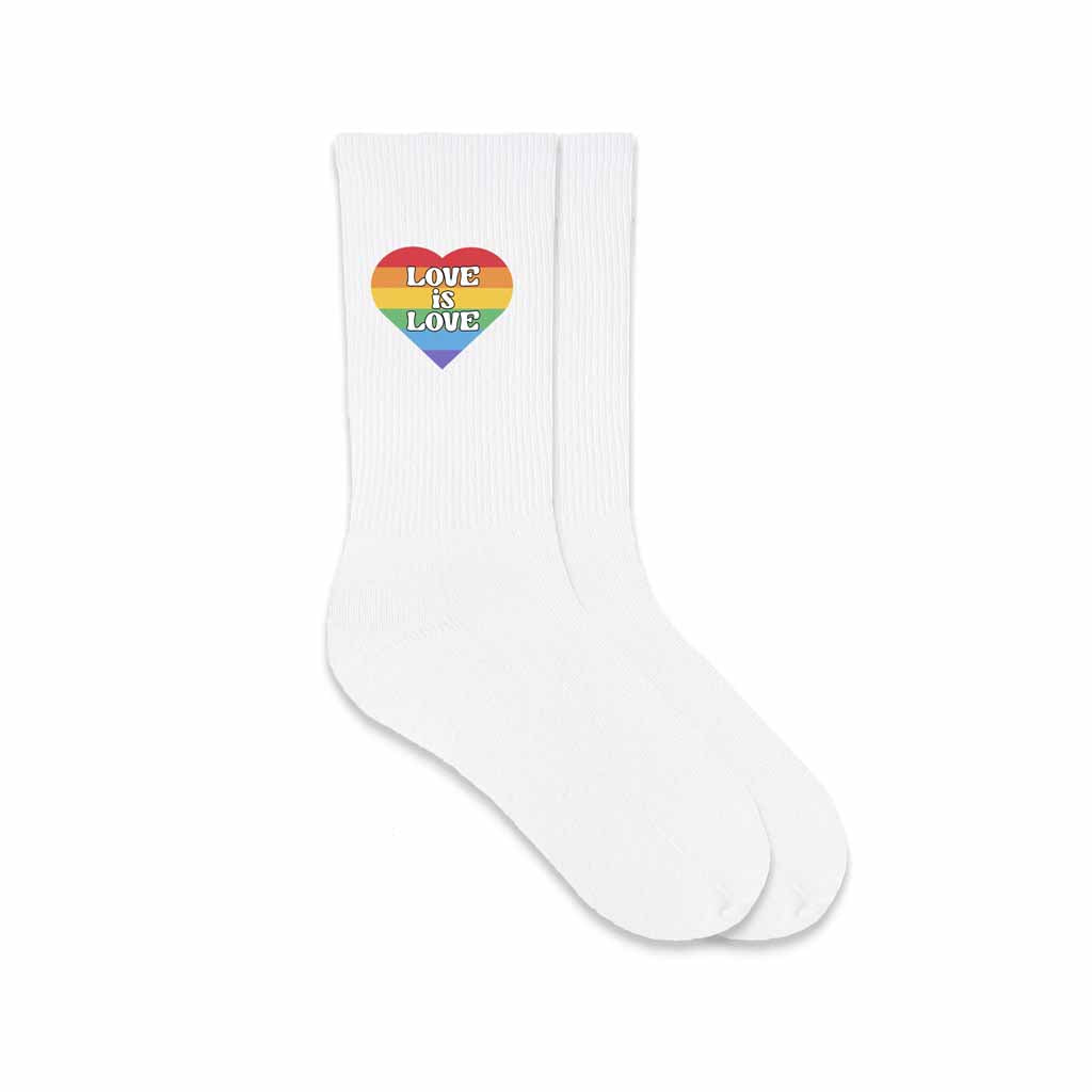 Show your pride and support for the LGBTQ community with these stylish love is love rainbow heart design on comfortable crew socks! 