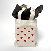 All over heart design digitally printed on mini gift bags sold as a set of two.