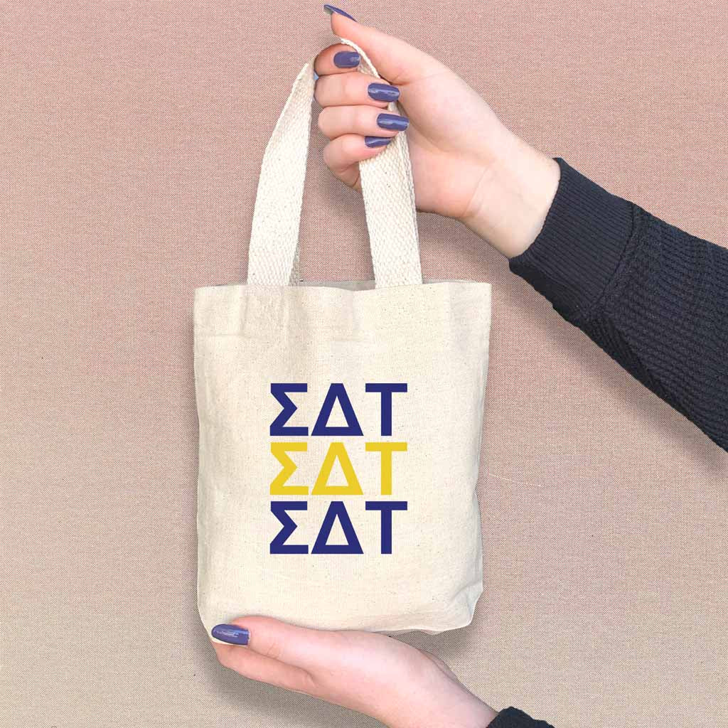 Sigma Delta Tau sorority letters in sorority colors digitally printed on the perfect mini size natural canvas tote bag.